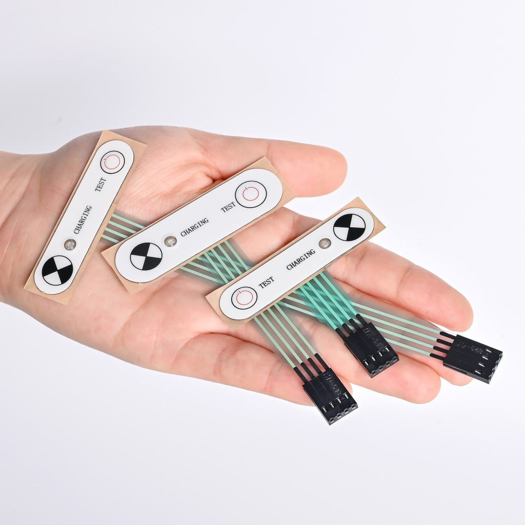 Tactile membrane keypad with stainless steel domes