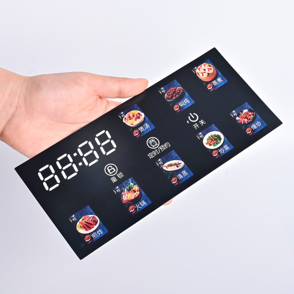 Custom capacitive touch graphic overlay with LED display window and color printed icons for smart kitchen appliances
