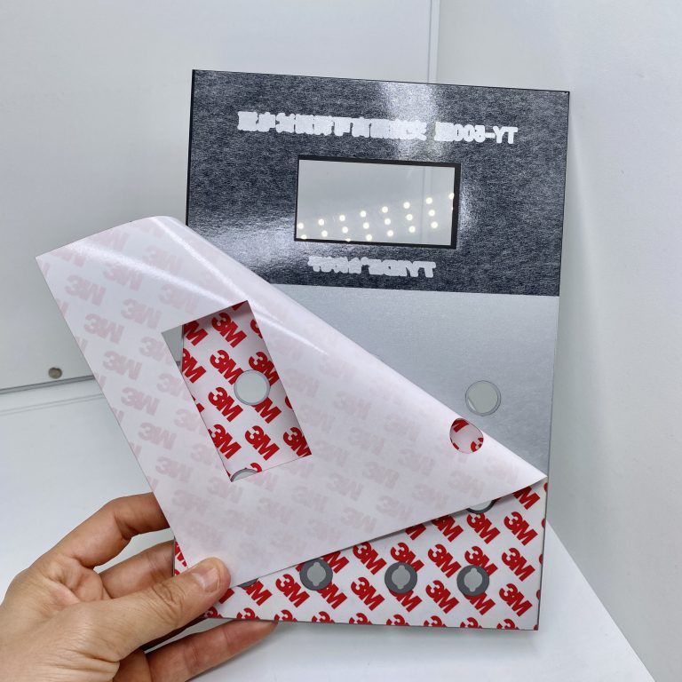 Peeling the 3M protective backing from a custom graphic overlay