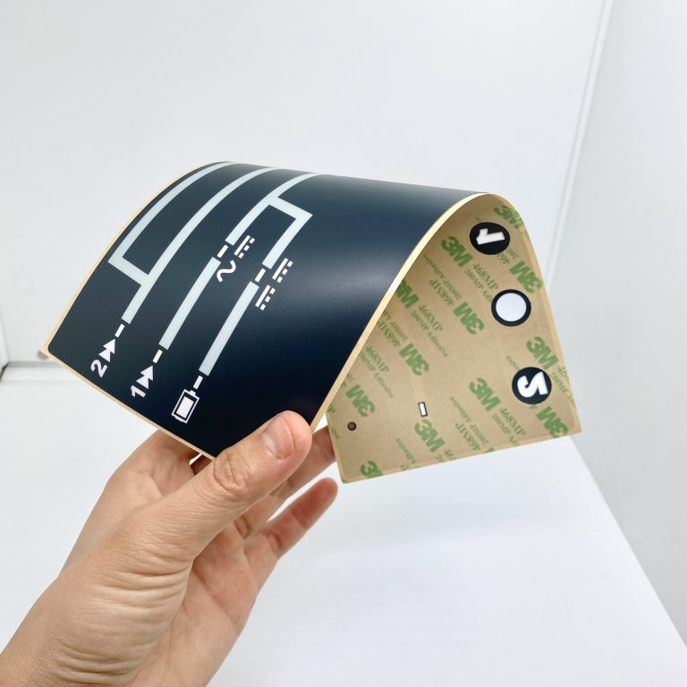 Flexible PET electronic equipment overlay showing 3M adhesive backing