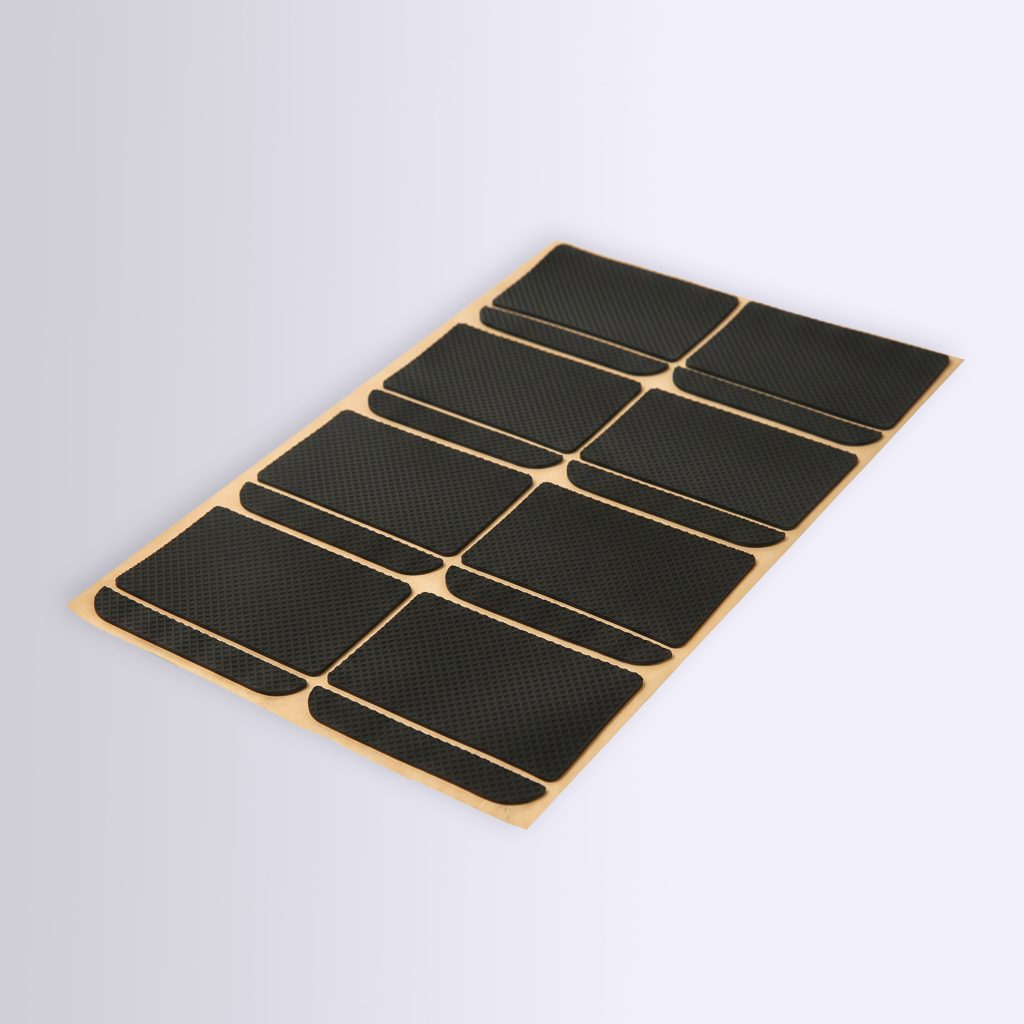 black non slip textured rubber bumper pads on release paper